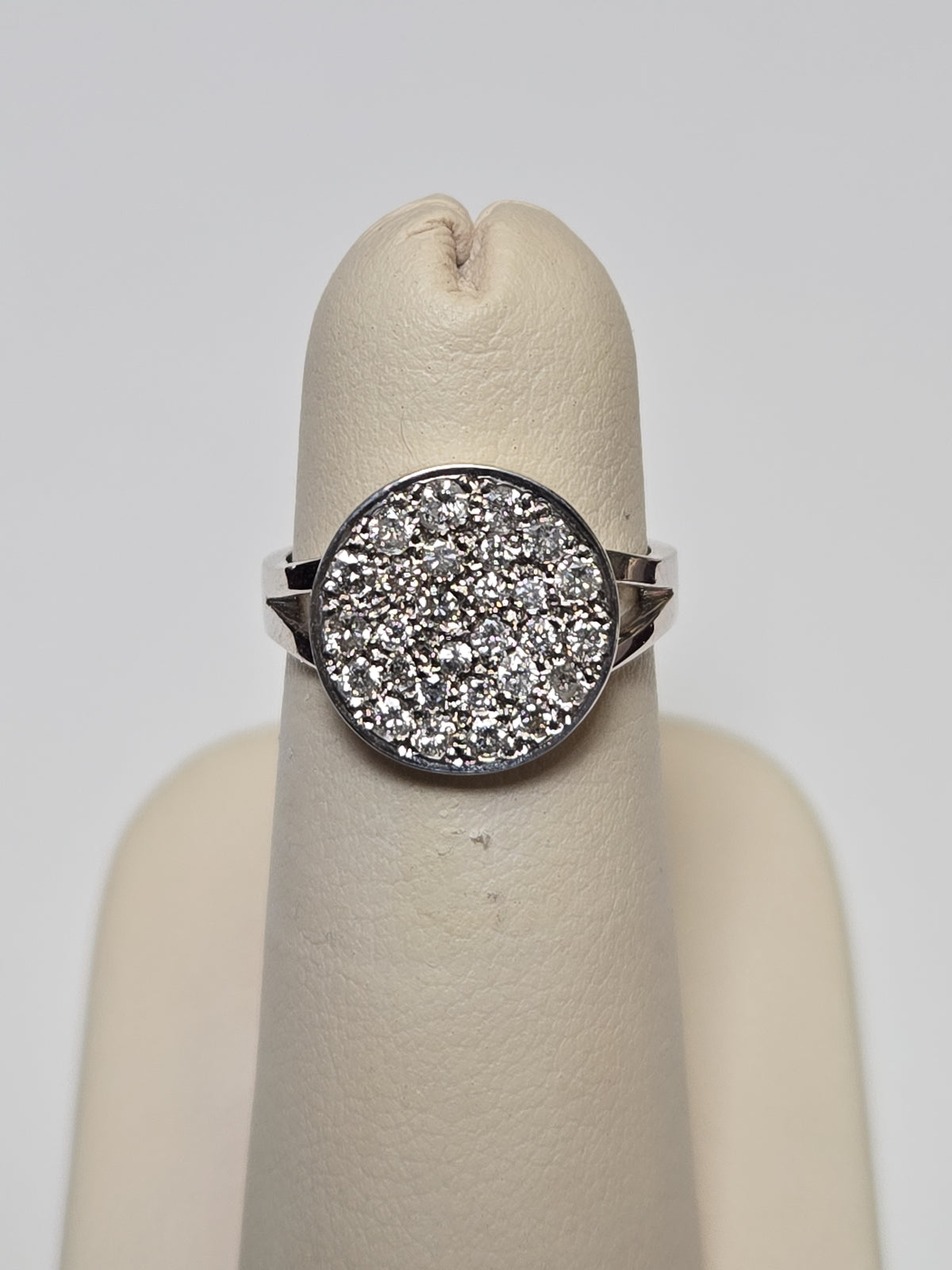 14K white gold cluster ring with 0.5ct round diamonds, featuring a delicate design from Chique Jewelry.