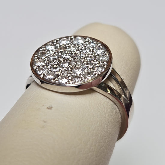 14K white gold cluster ring with 0.5ct round diamonds from Chique Jewelry, showcasing a sparkling design and elegant craftsmanship.