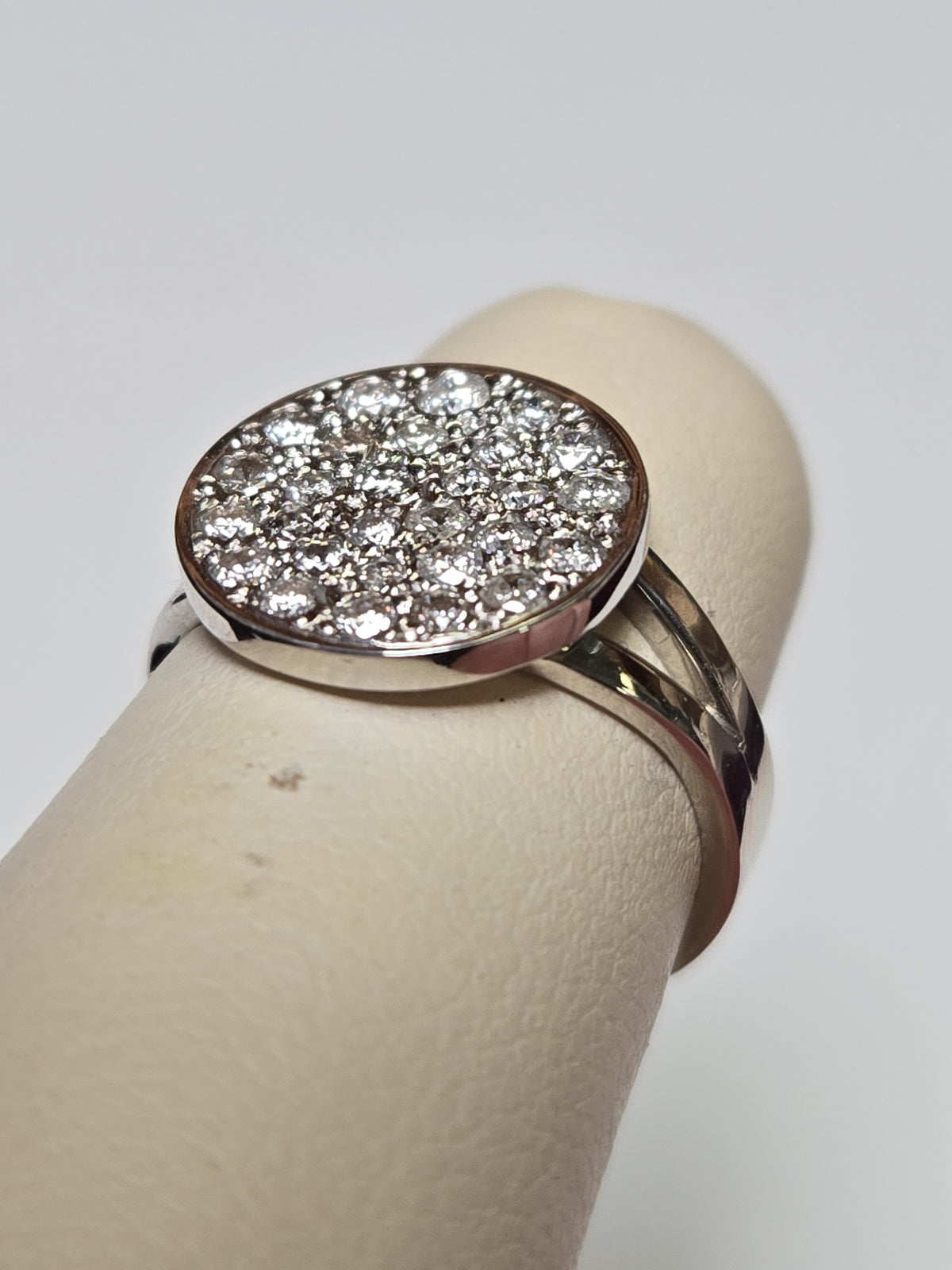 14K white gold cluster ring with 0.5ct round diamonds from Chique Jewelry, showcasing a sparkling design and elegant craftsmanship.