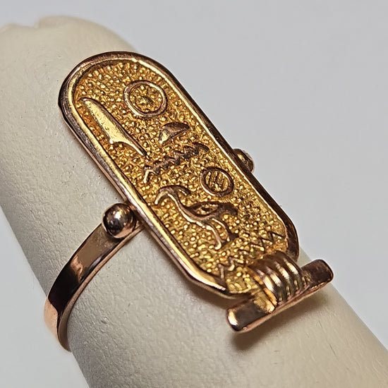 Gold Egyptian hieroglyphics ring by Chique Jewelry, 12K solid gold with detailed hieroglyphic engravings, weighs 2.5 grams.
