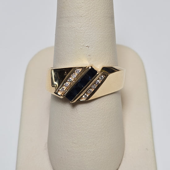 14K gold ring with 0.25ct square blue sapphires and intricate band design, weighing 7.9 grams by Chique Jewelry.