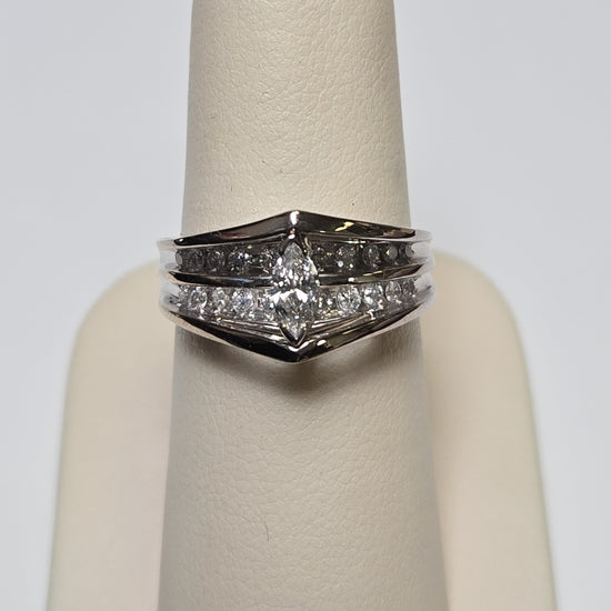 14K white gold ring with 0.2ct marquise diamond, featuring a sleek design and weighing 4.6 grams.
