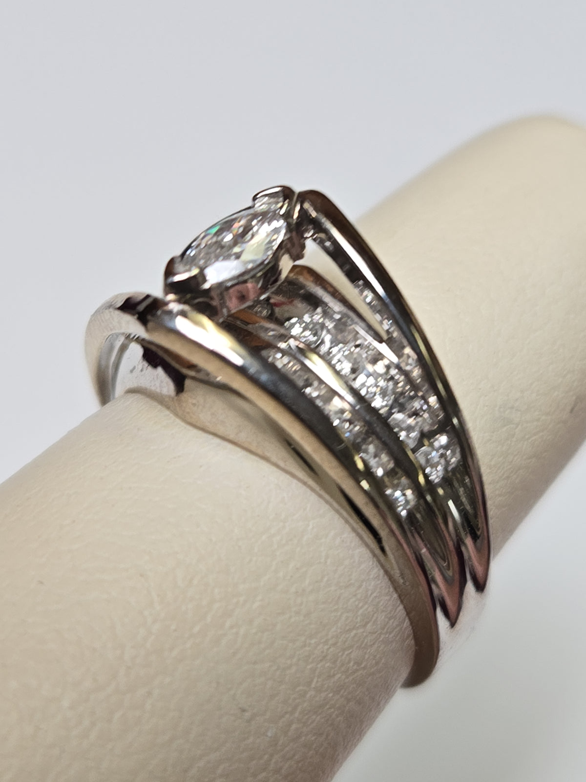14K white gold ring with a 0.2ct marquise diamond, crafted by Chique Jewelry, showcasing elegant fine jewelry design.