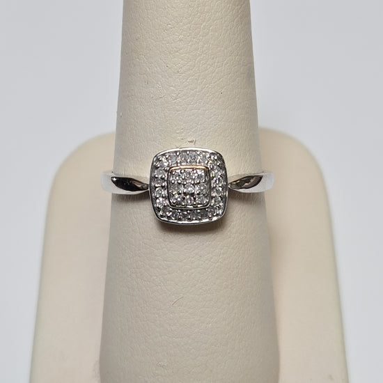9K white gold cluster ring with 0.25ct round diamonds, featuring a delicate design and weighing 2.2 grams by Chique Jewelry