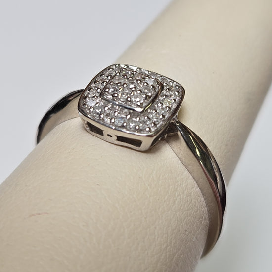 9K white gold cluster ring with 0.25ct round diamonds, featuring a elegant design and weighing 2.2 grams by Chique Jewelry.