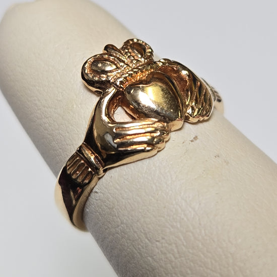 9K gold Claddagh ring with intricate detailing, weighing 3.8 grams, by Chique Jewelry.