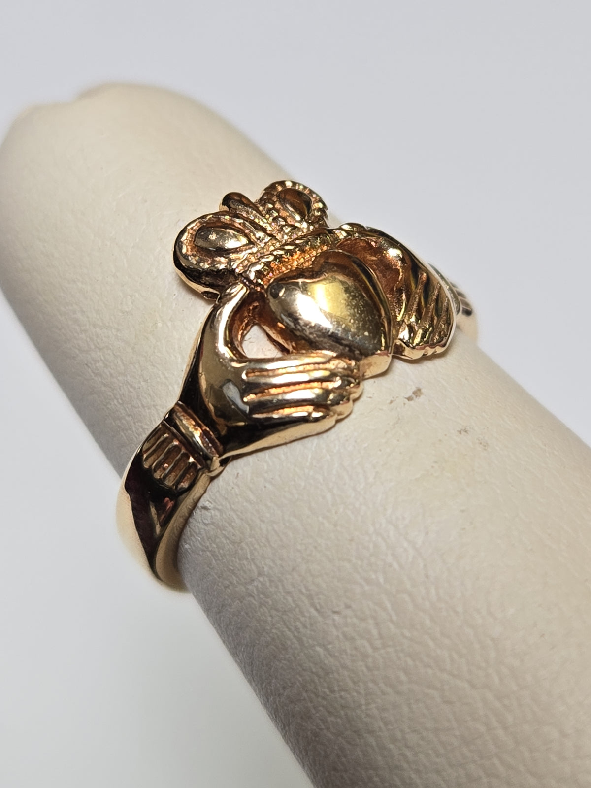 9K gold Claddagh ring with intricate detailing, weighing 3.8 grams, by Chique Jewelry.