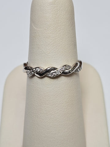 10K white gold ring with 0.25ct round diamonds, sleek jewelry design by Chique Jewelry, showcasing the sparkling gemstone.