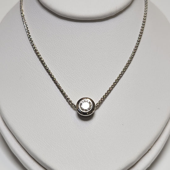 14K white gold spiga chain necklace with 0.25ct round diamond pendant, 18-inch length, from Chique Jewelry.