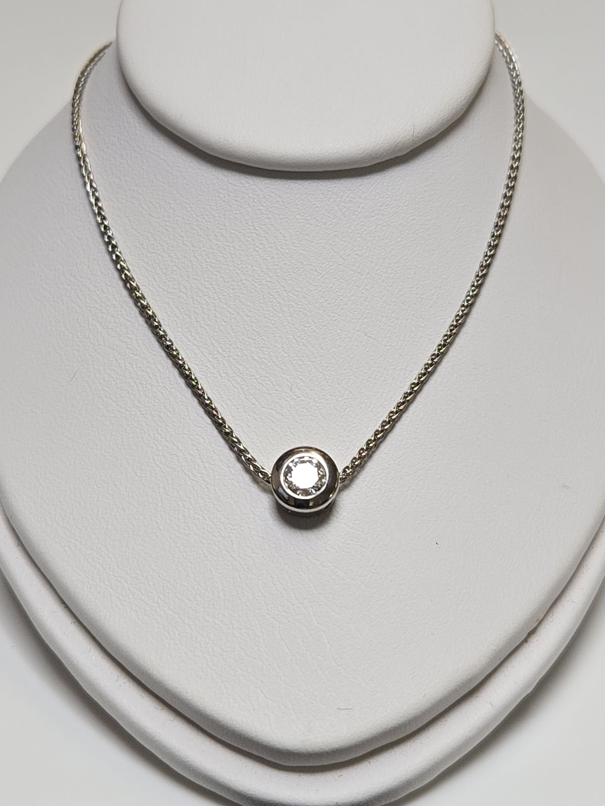 14K white gold spiga chain necklace with 0.25ct round diamond pendant, 18-inch length, from Chique Jewelry.