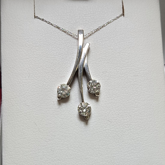14K white gold pendant with 0.83ct round diamonds, delicate jewelry piece from Chique Jewelry, showcasing sparkling gemstone details.