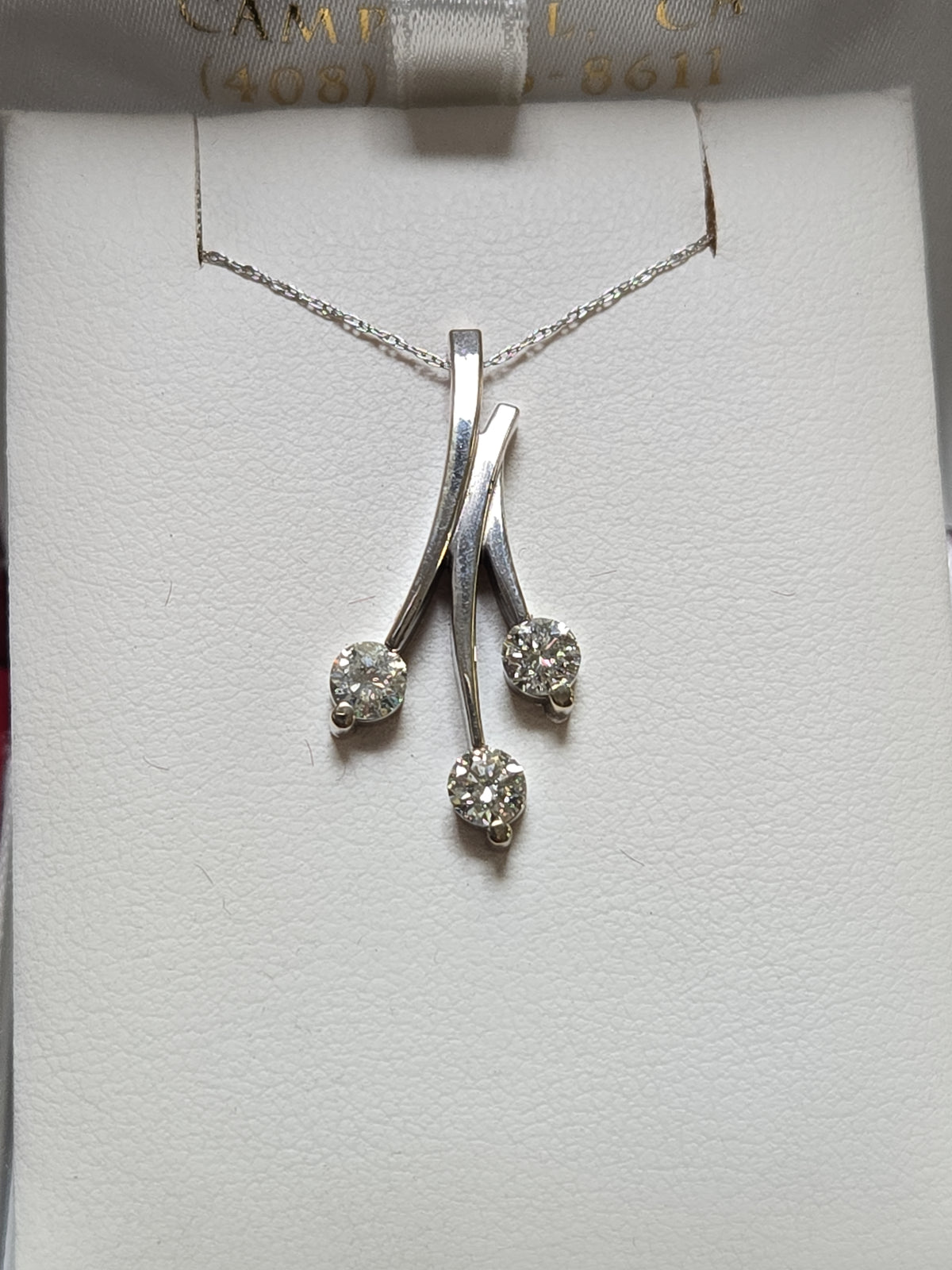 14K white gold pendant with 0.83ct round diamonds, delicate jewelry piece from Chique Jewelry, showcasing sparkling gemstone details.