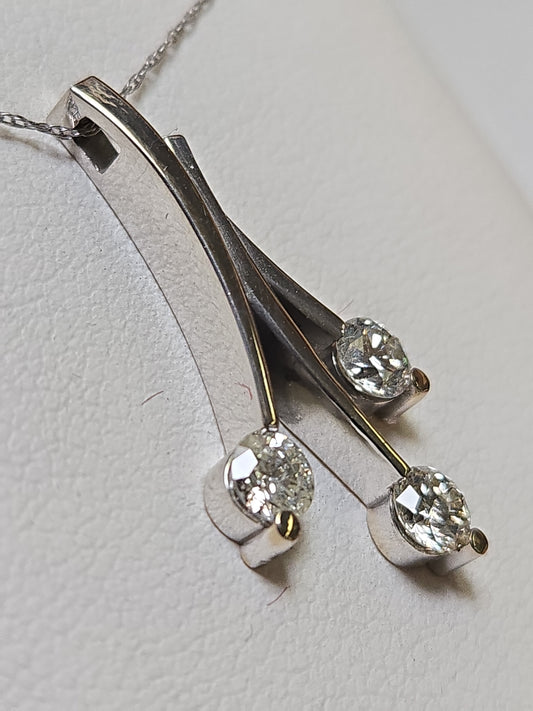 14K white gold pendant with 0.83ct round diamonds, crafted by Chique Jewelry, featuring a elegant and sparkling design.
