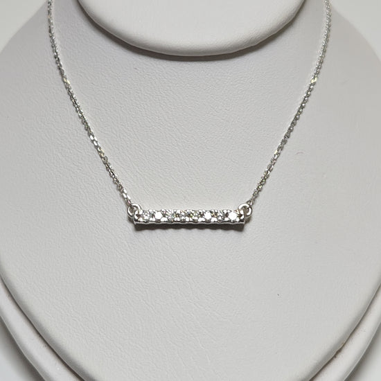 14K white gold cable chain necklace with diamond cut design and round diamonds, weighs 2g, from Chique Jewelry.
