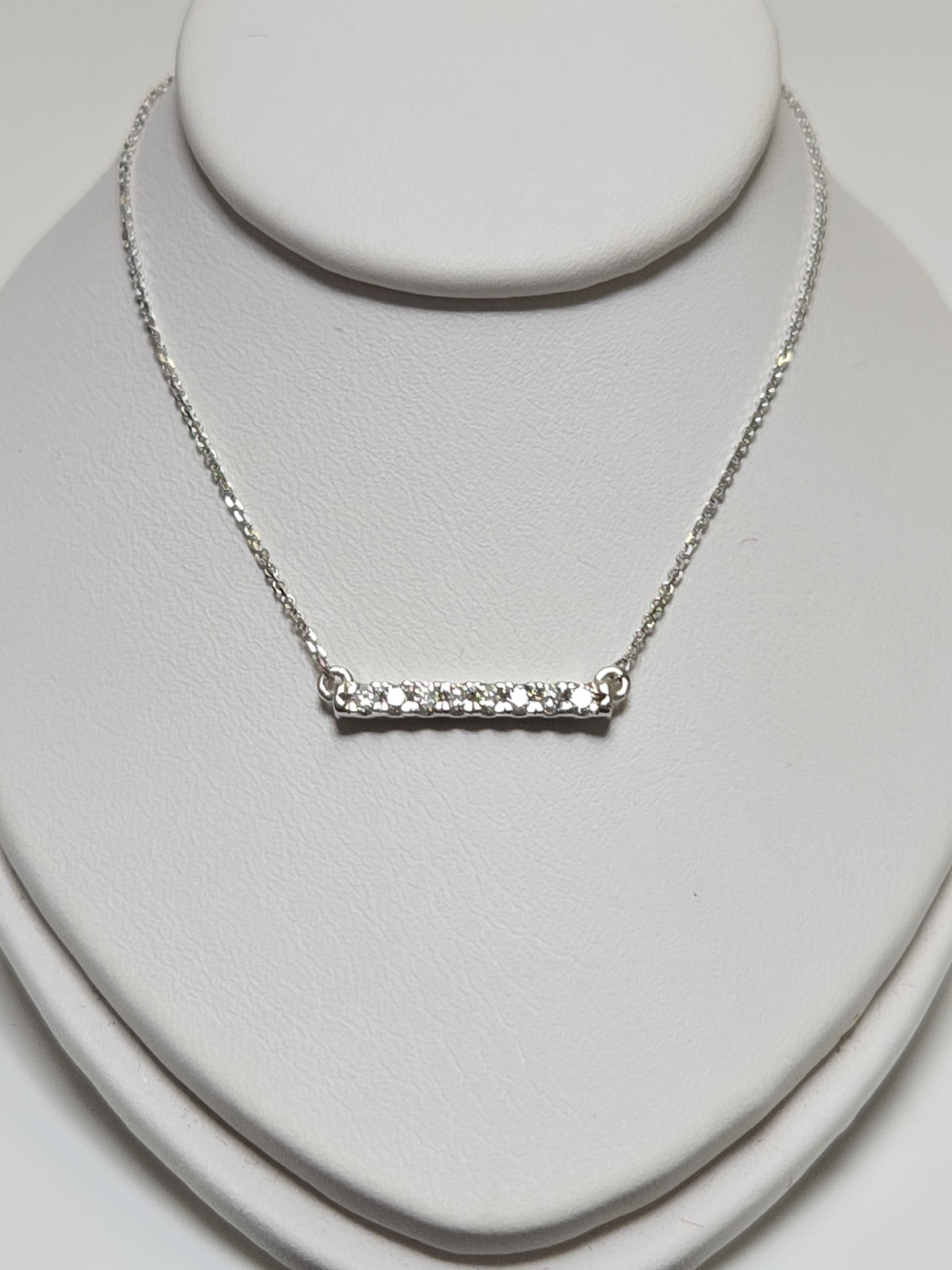 14K white gold cable chain necklace with diamond cut design and round diamonds, weighs 2g, from Chique Jewelry.