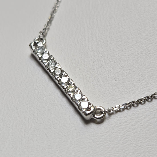 14K white gold cable chain necklace with round diamonds, featuring a pendant with 0.16ct diamonds, by Chique Jewelry.