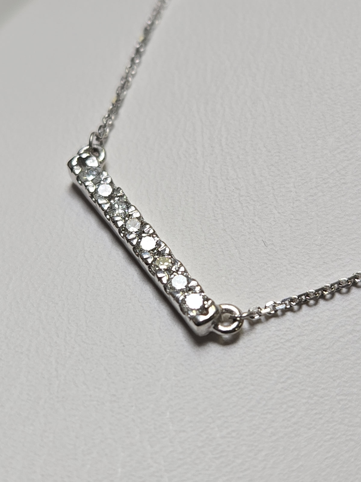 14K white gold cable chain necklace with round diamonds, featuring a pendant with 0.16ct diamonds, by Chique Jewelry.