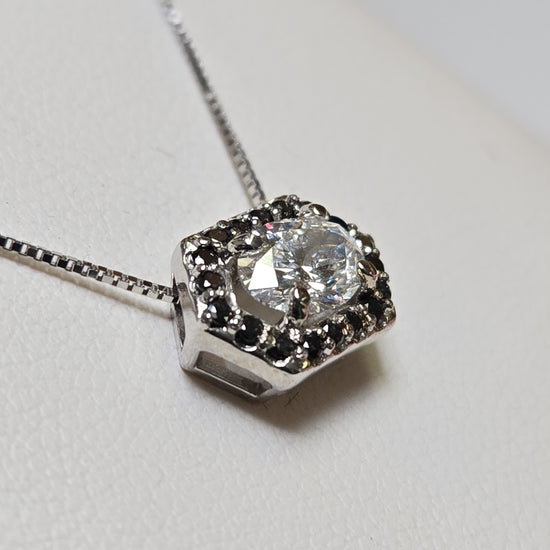 14K white gold pendant featuring a 0.72ct oval lab-created diamond, crafted by Chique Jewelry, with a delicate design.