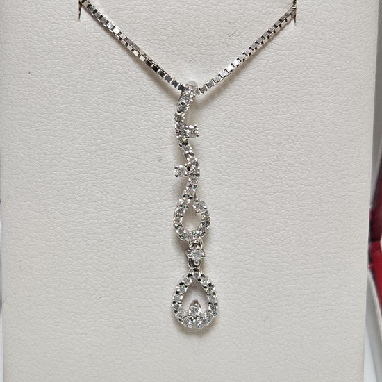 18K white gold pendant featuring a 0.41ct round diamond, crafted by Chique Jewelry, with a delicate and elegant design.