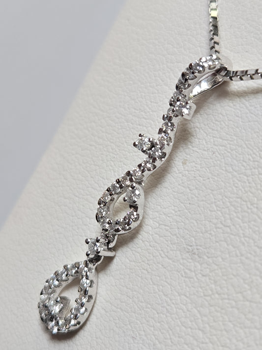 18K white gold pendant with a 0.41ct round diamond, featuring elegant design, weighing 1.8 grams, from Chique Jewelry.