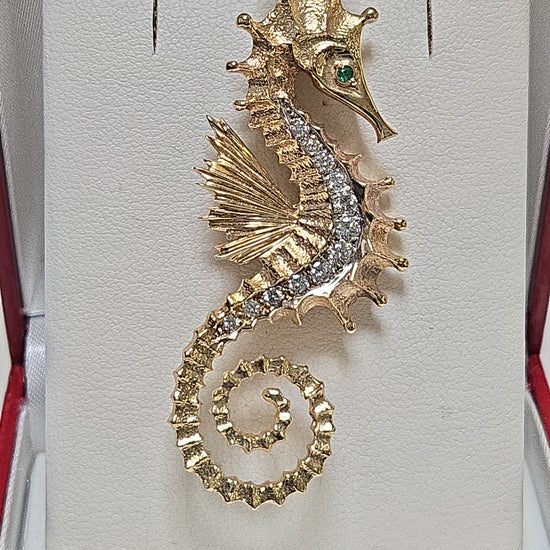 14K gold brooch with 0.5ct round diamond from Chique Jewelry, featuring elegant design and 9.8g weight.