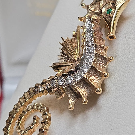 14K gold brooch with 0.5ct round diamond, elegant jewelry piece by Chique Jewelry, showcasing intricate design and sparkling gemstone.