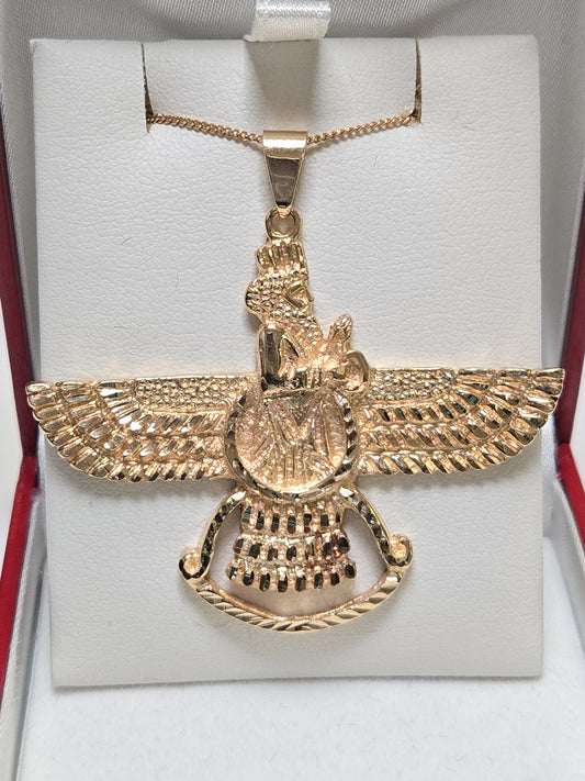 18K gold Farvahar pendant from Chique Jewelry, showcasing intricate design and craftsmanship in a detailed jewelry image.