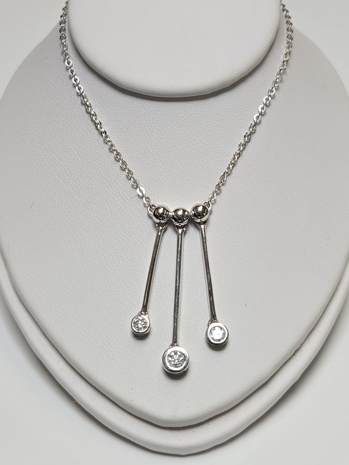 14K white gold flat cable chain necklace with 0.25ct round diamonds, 16-inch length, from Chique Jewelry.
