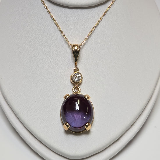 14K gold baby rope chain necklace with 13.08ct lab-created alexandrite pendant, weighs 5.1 grams, from Chique Jewelry.