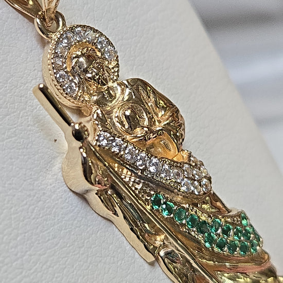 14K gold Jesus pendant with round cubic zirconia, detailed religious jewelry piece by Chique Jewelry.