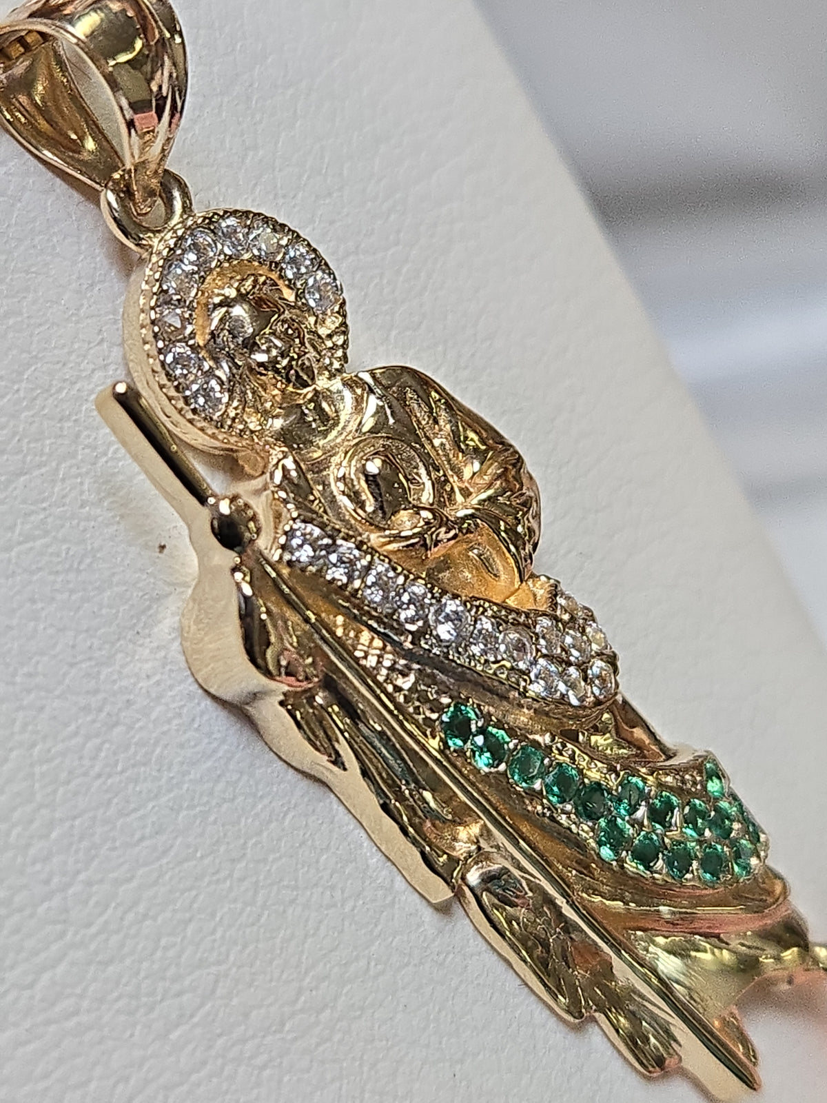 14K gold Jesus pendant with round cubic zirconia, detailed religious jewelry piece by Chique Jewelry.