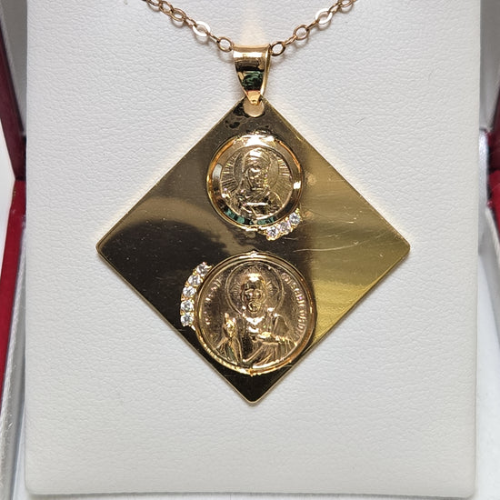 18K gold Jesus and Muhammed pendant with 0.08ct round diamonds from Chique Jewelry, showcasing detailed religious symbol design.