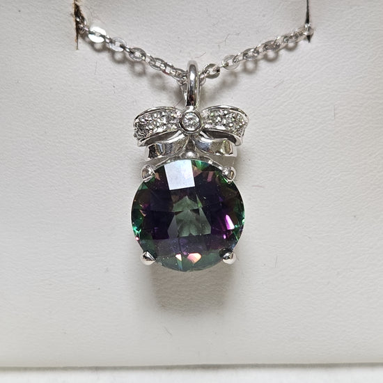 14K white gold pendant featuring a round treated mystic topaz gemstone, designed by Chique Jewelry.