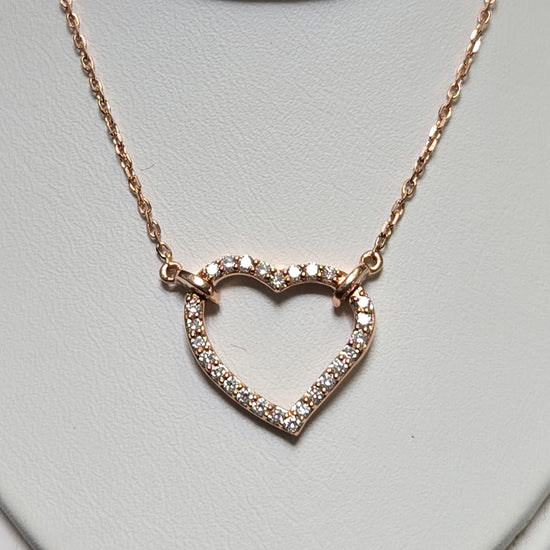 14K rose gold heart pendant necklace with lab-created diamonds from Chique Jewelry, 2.7g, featuring a delicate, elegant design.