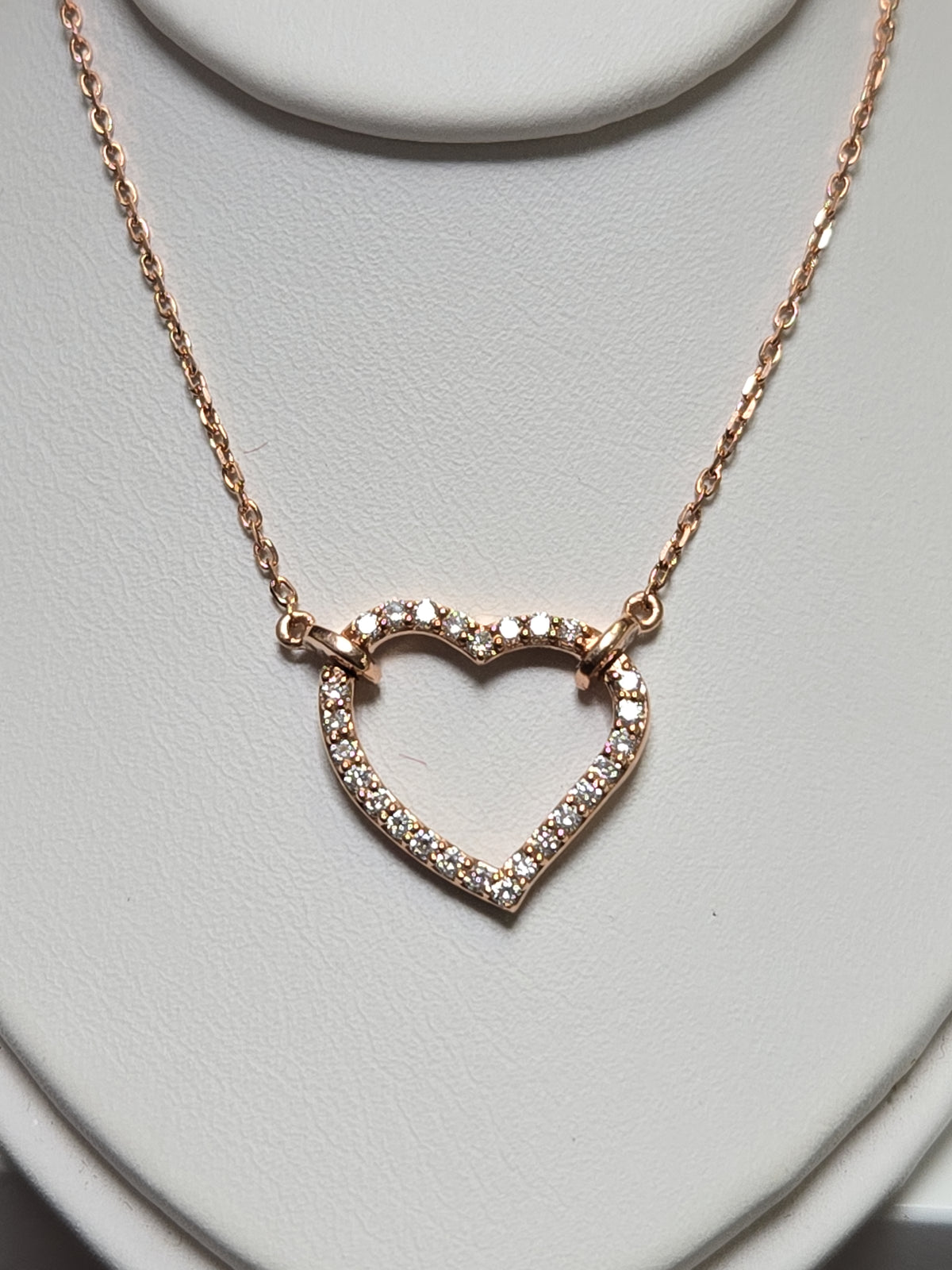 14K rose gold heart pendant necklace with lab-created diamonds from Chique Jewelry, 2.7g, featuring a delicate, elegant design.