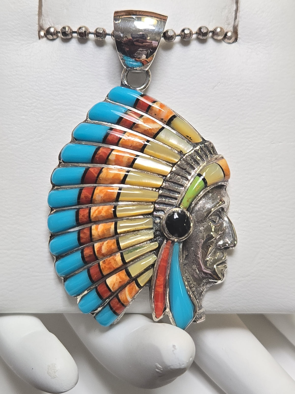925 Sterling Silver Native American pendant with assorted gemstones, weighing 13.9g, featuring intricate design and vibrant stone details.