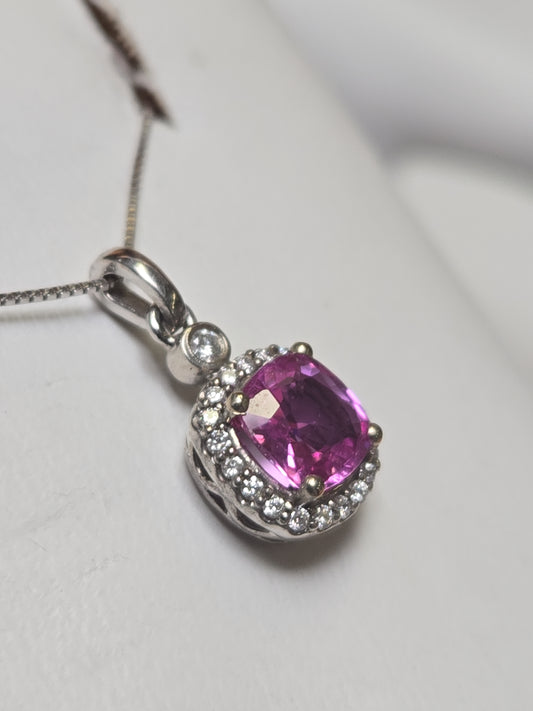 14K white gold pendant with 1.05ct cushion pink sapphire and 1.4g weight, featuring elegant jewelry craftsmanship.