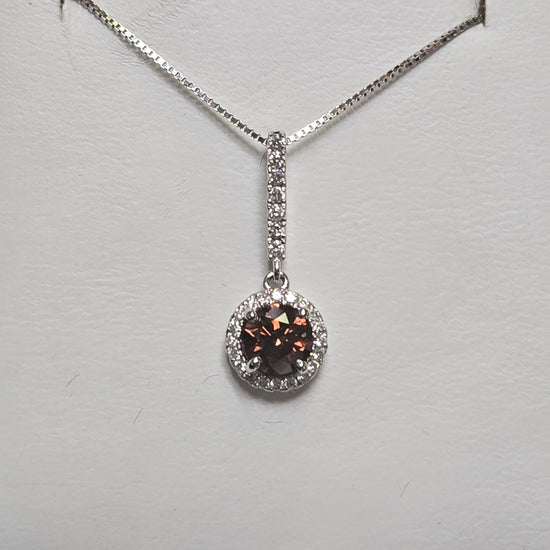 14K white gold pendant featuring a 0.71ct round chocolate diamond, crafted by Chique Jewelry, with a delicate and elegant design.