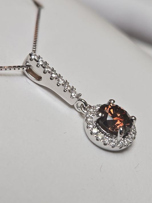 14K white gold pendant featuring a 0.71ct round chocolate diamond, from Chique Jewelry, with a delicate and elegant design.