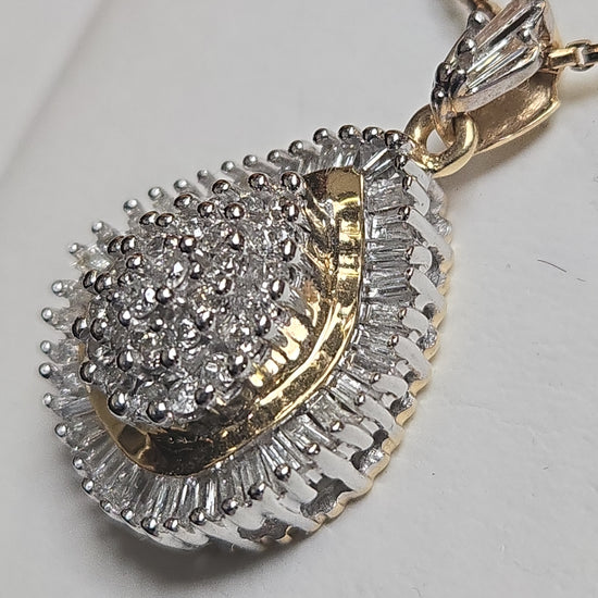 14K multi-tone gold cluster pendant with 1.5ct round diamond, featuring intricate design and weighing 5.2 grams.