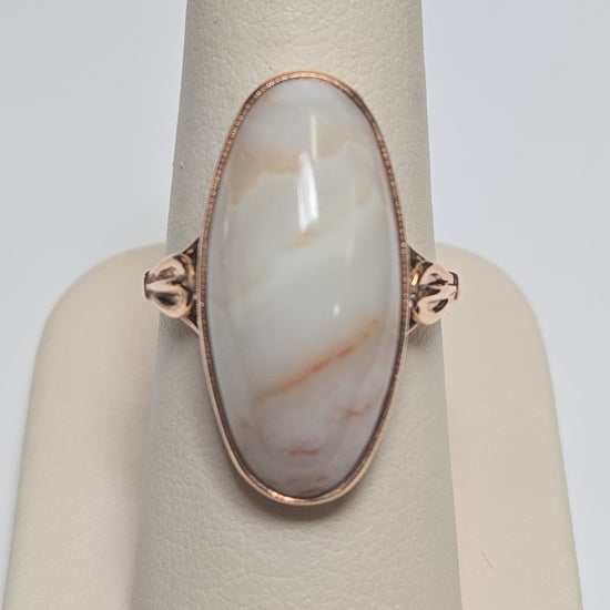 14K rose gold ring featuring an oval agate gemstone, weighing 6.4 grams, from Chique Jewelry.