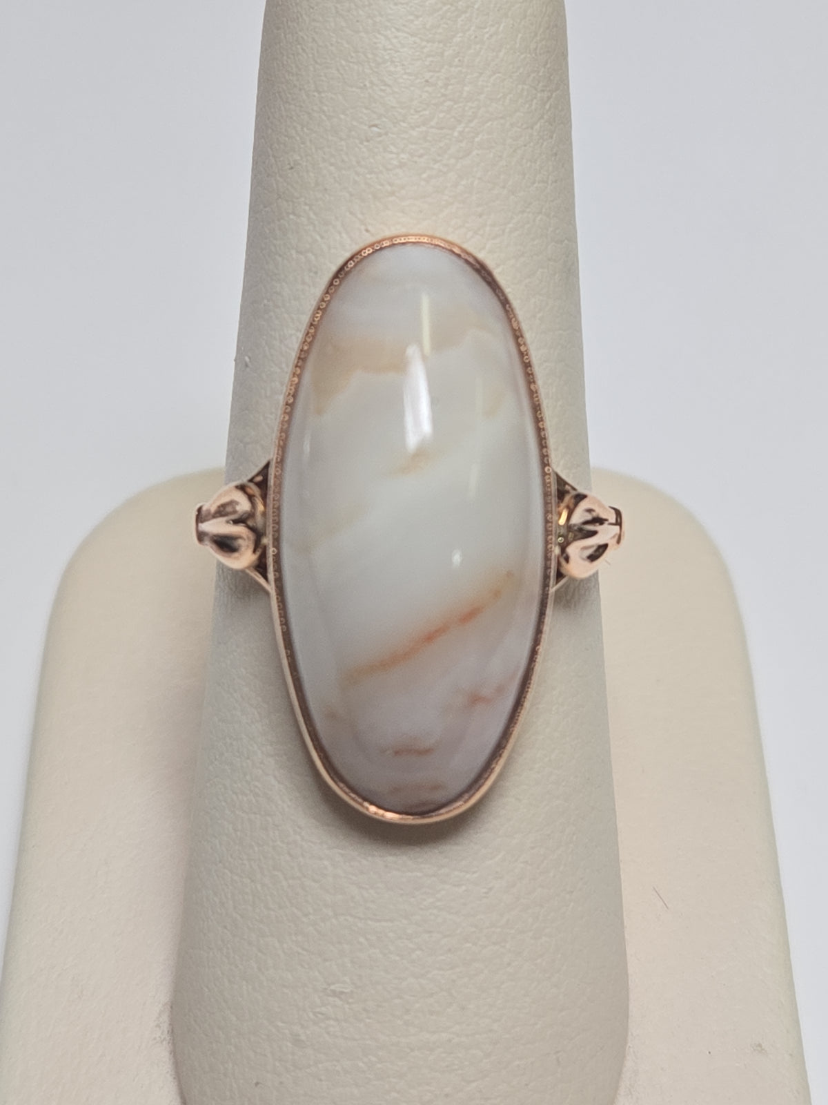 14K rose gold ring featuring an oval agate gemstone, weighing 6.4 grams, from Chique Jewelry.