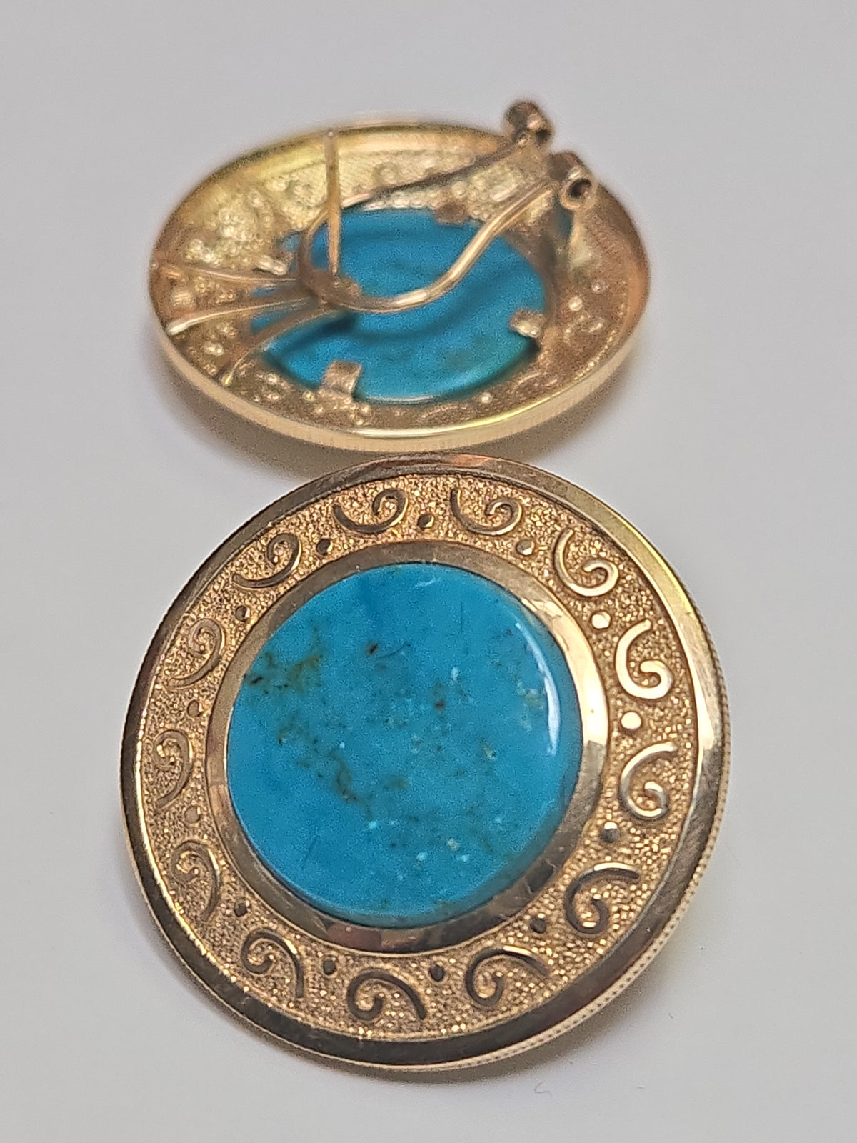 14K gold statement earrings with round turquoise stones from Chique Jewelry, showcasing elegant jewelry design.