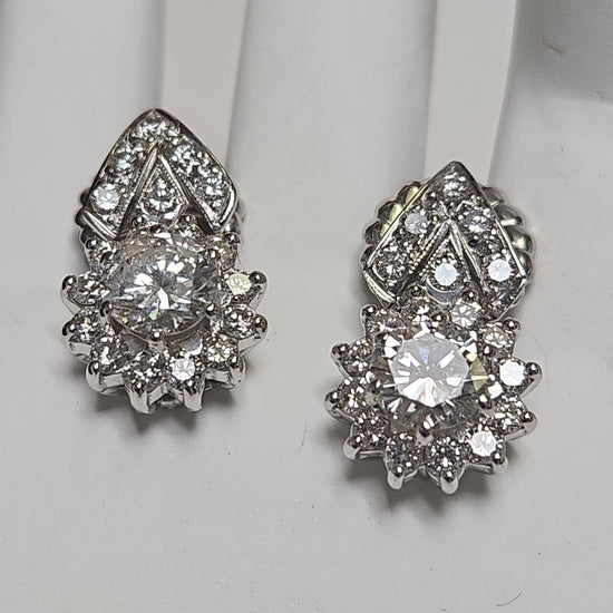 14K white gold stud earrings with 2.4ct round diamonds, featuring elegant jewelry design and a secure post backing.