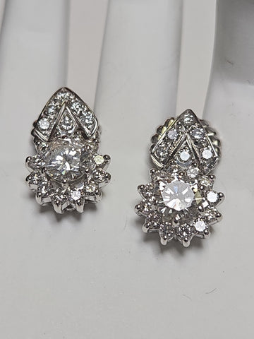 14K white gold stud earrings with 2.4ct round diamonds, featuring elegant jewelry design and a secure post backing.