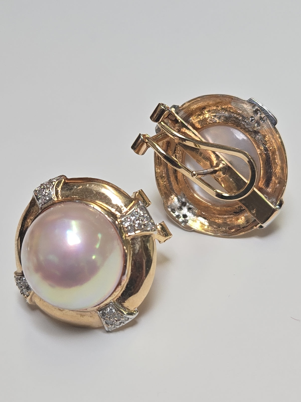 14K gold statement earrings with round mabe pearl, featuring elegant design and polished finish from Chique Jewelry.
