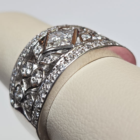 14K white gold ring with 0.33ct princess-cut diamonds, elegant jewelry by Chique Jewelry featuring a sleek design.