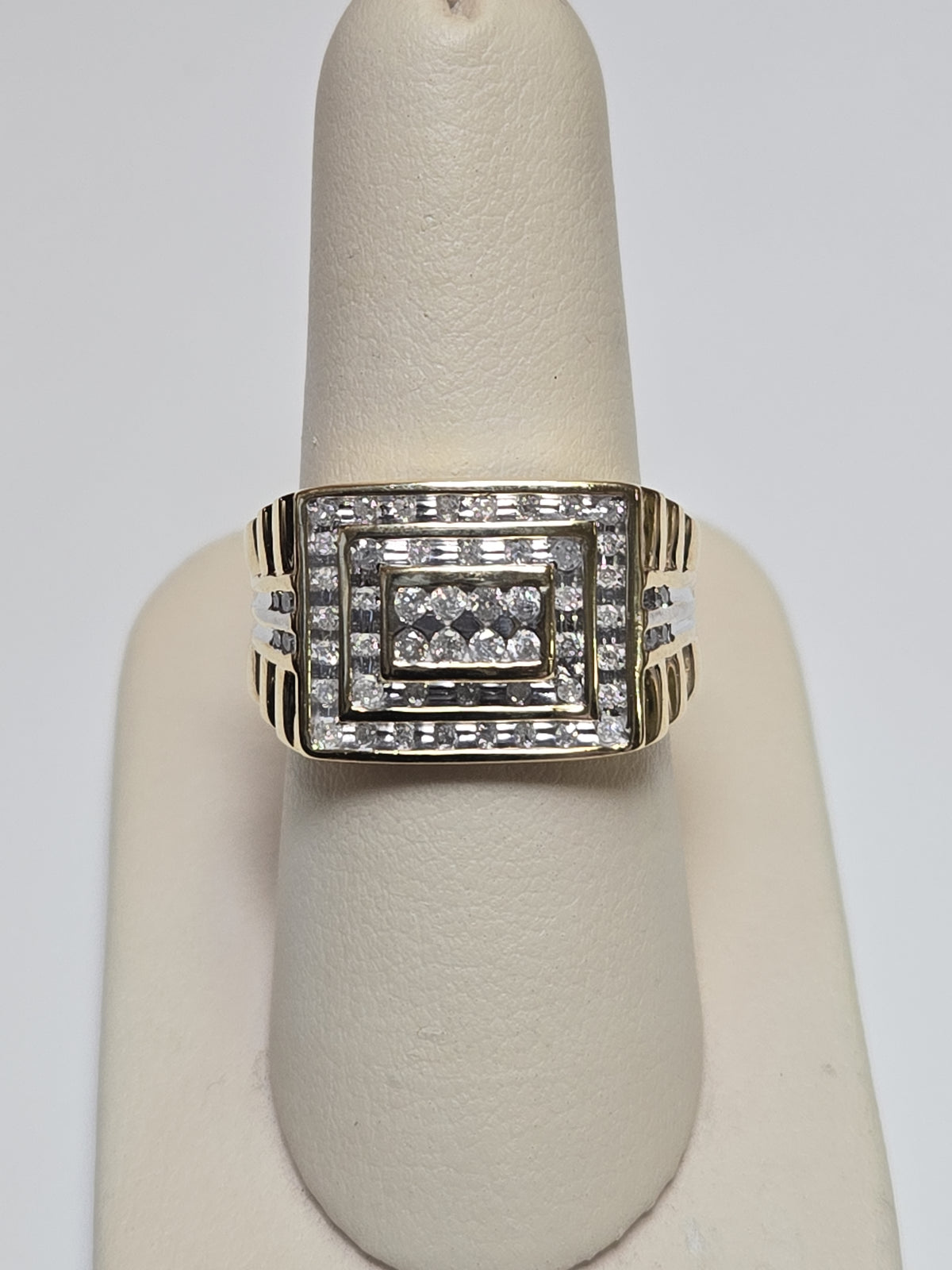 10K gold ring with 0.75ct round diamonds, elegant jewelry piece showing the sparkling gemstones and polished band.