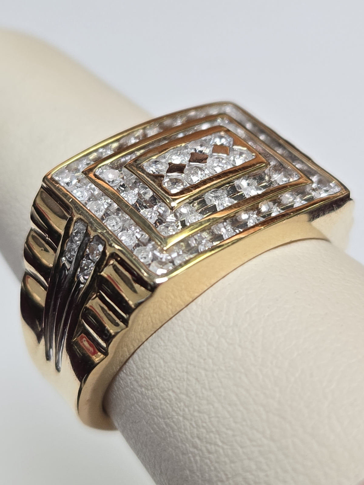 10K gold ring with 0.75ct round diamonds from Chique Jewelry, featuring a sleek design and 7.4g weight.
