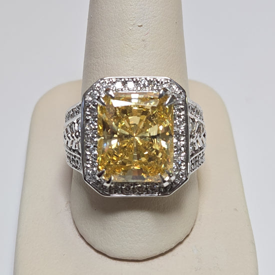 14K gold ring with emerald-cut simulated diamond and Lannyte accents, weight 15.6g, by Chique Jewelry.
